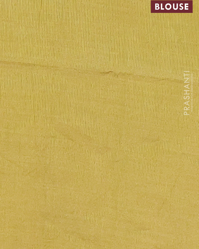 Semi raw silk saree lime yellow with zari woven buttas and rettapet zari woven border