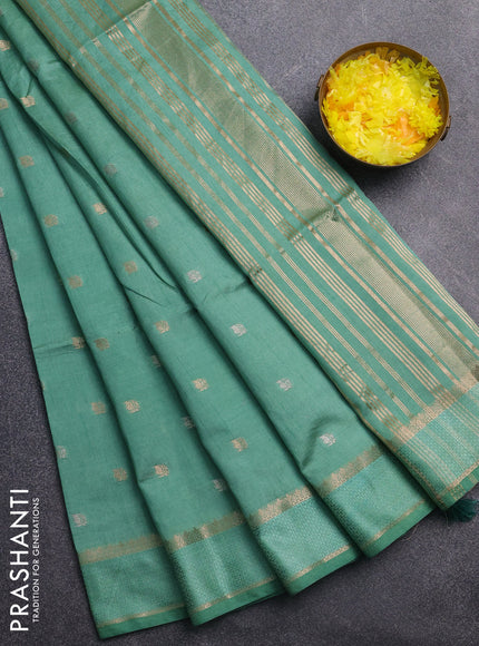 Semi raw silk saree pastel green with zari woven buttas and rettapet zari woven border