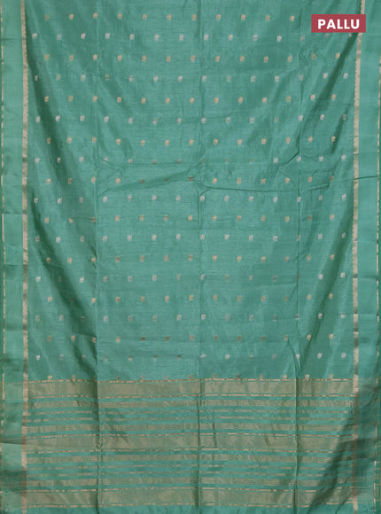 Semi raw silk saree pastel green with zari woven buttas and rettapet zari woven border
