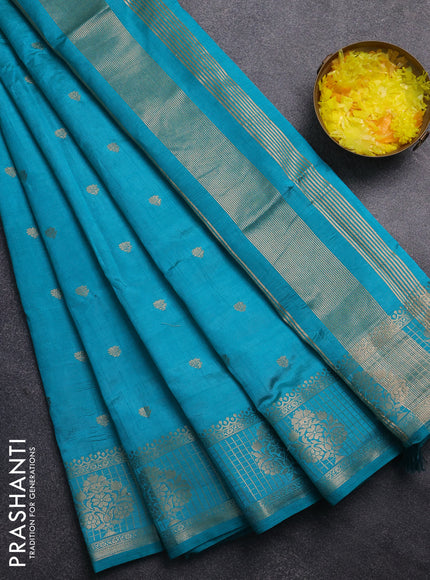 Semi raw silk saree teal blue with zari woven buttas and zari checked butta border