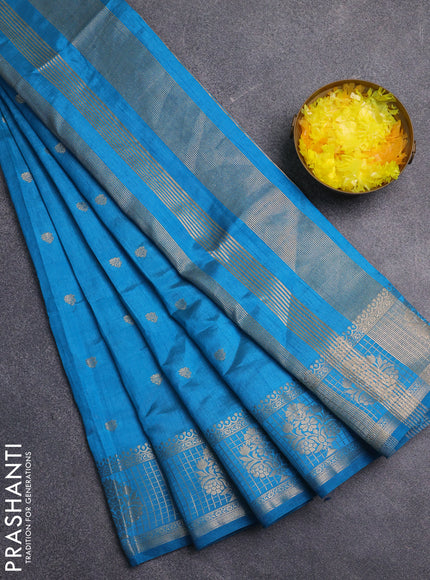 Semi raw silk saree cs blue with zari woven buttas and zari checked butta border