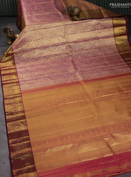 Pure kanchipuram silk saree dual shade of gold and purple with allover zari woven brocade weaves and zari woven border