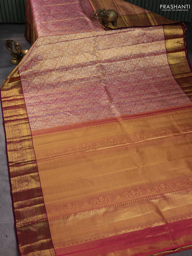Pure kanchipuram silk saree dual shade of gold and purple with allover zari woven brocade weaves and zari woven border