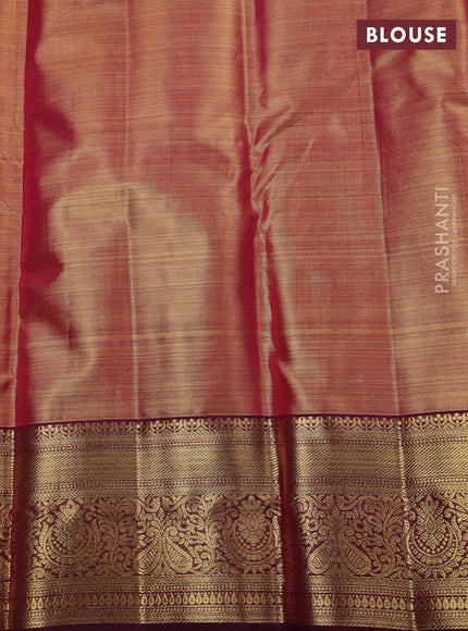 Pure kanchipuram silk saree dual shade of gold and purple with allover zari woven brocade weaves and zari woven border