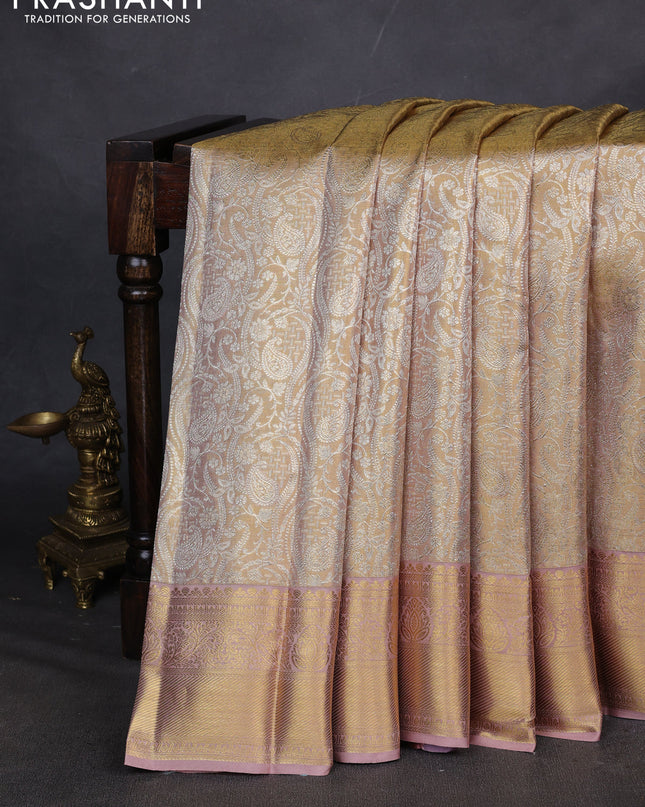 Pure kanchipuram silk saree gold and peach shade with allover zari woven brocade weaves and zari woven border