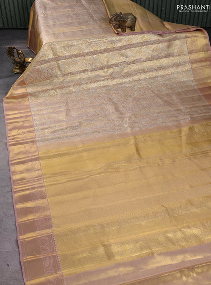 Pure kanchipuram silk saree gold and peach shade with allover zari woven brocade weaves and zari woven border