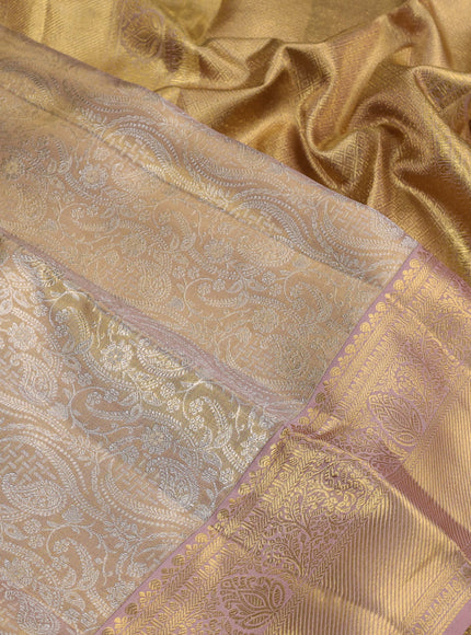 Pure kanchipuram silk saree gold and peach shade with allover zari woven brocade weaves and zari woven border