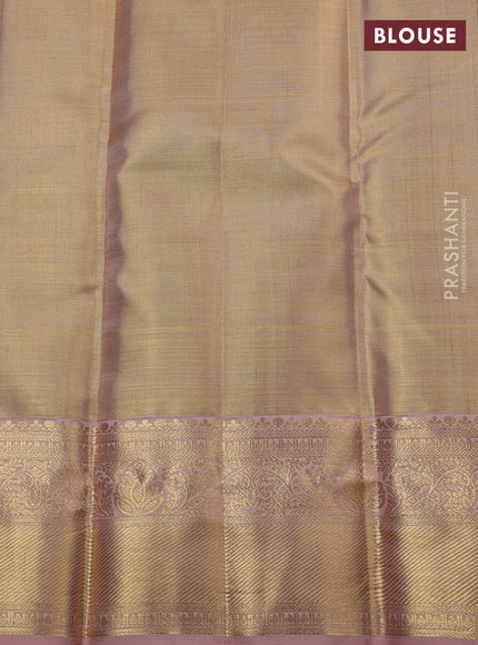 Pure kanchipuram silk saree gold and peach shade with allover zari woven brocade weaves and zari woven border