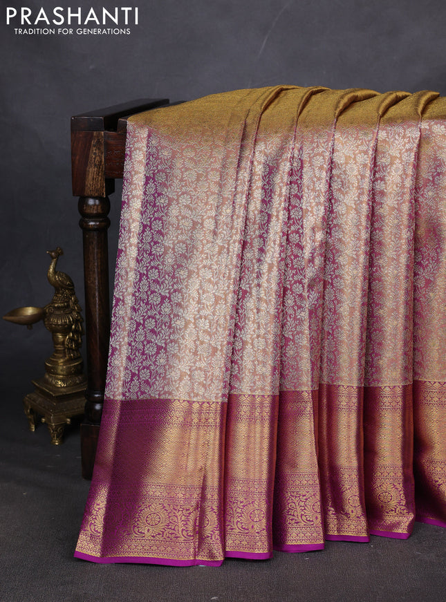 Pure kanchipuram silk saree dual shade of gold and purple with allover zari woven brocade weaves and zari woven border