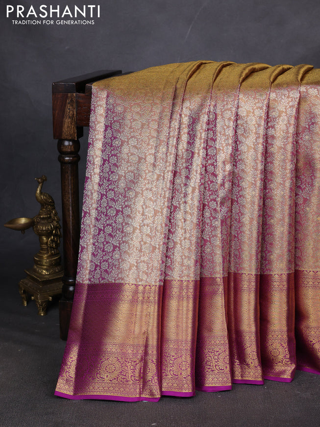 Pure kanchipuram silk saree dual shade of gold and purple with allover zari woven brocade weaves and zari woven border