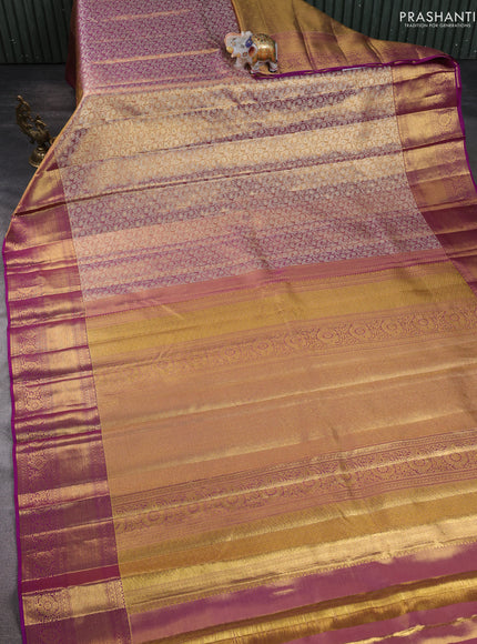Pure kanchipuram silk saree dual shade of gold and purple with allover zari woven brocade weaves and zari woven border