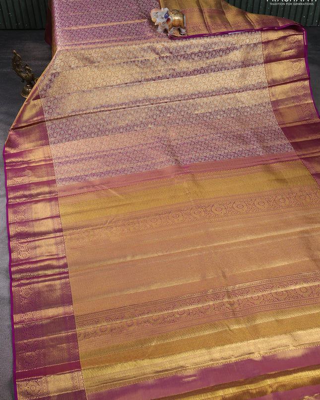 Pure kanchipuram silk saree dual shade of gold and purple with allover zari woven brocade weaves and zari woven border