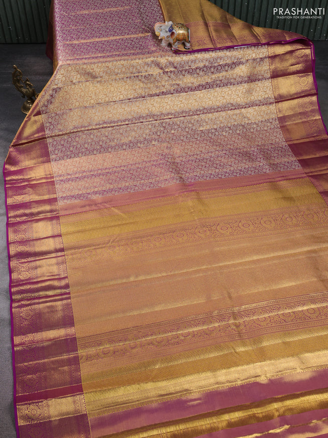 Pure kanchipuram silk saree dual shade of gold and purple with allover zari woven brocade weaves and zari woven border