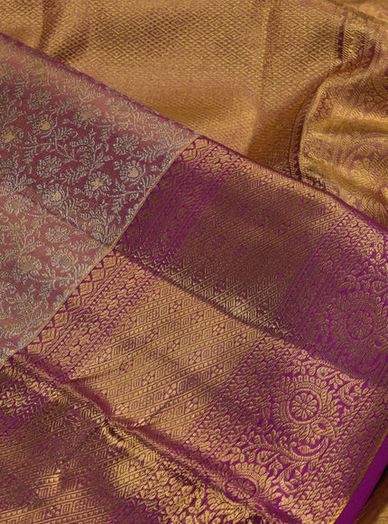 Pure kanchipuram silk saree dual shade of gold and purple with allover zari woven brocade weaves and zari woven border