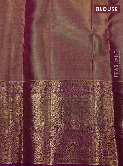 Pure kanchipuram silk saree dual shade of gold and purple with allover zari woven brocade weaves and zari woven border