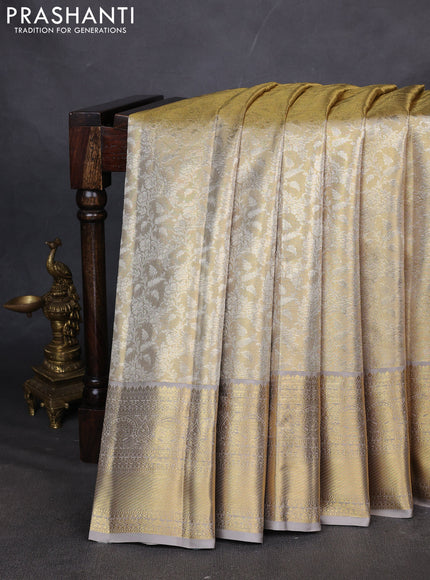 Pure kanchipuram silk saree gold and grey with allover zari woven brocade weaves and zari woven border
