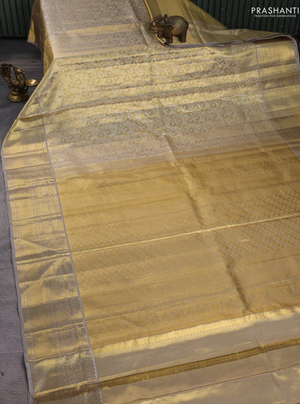 Pure kanchipuram silk saree gold and grey with allover zari woven brocade weaves and zari woven border