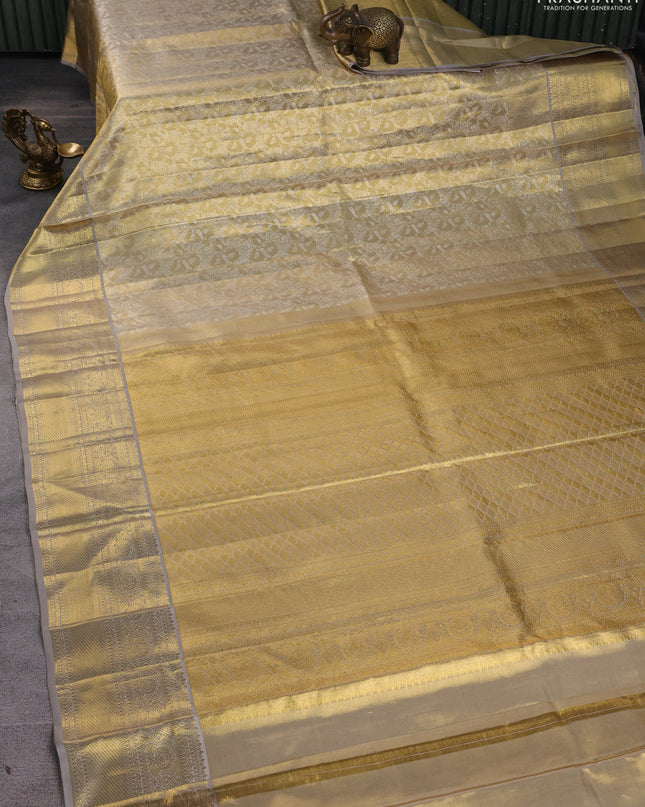 Pure kanchipuram silk saree gold and grey with allover zari woven brocade weaves and zari woven border
