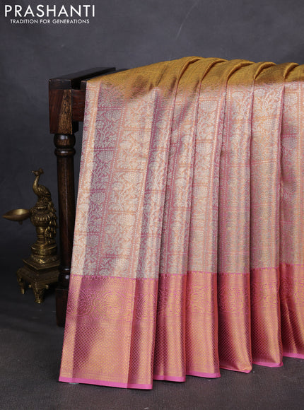 Pure kanchipuram silk saree dual shade of gold and light pink with allover zari woven brocade weaves and zari woven border