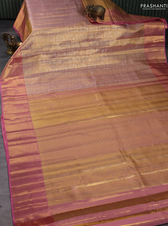 Pure kanchipuram silk saree dual shade of gold and light pink with allover zari woven brocade weaves and zari woven border