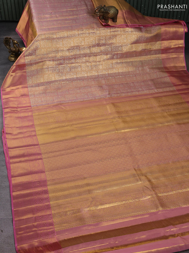 Pure kanchipuram silk saree dual shade of gold and light pink with allover zari woven brocade weaves and zari woven border