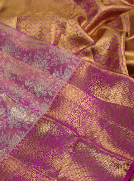 Pure kanchipuram silk saree dual shade of pink and purple with allover zari woven brocade weaves and zari woven border