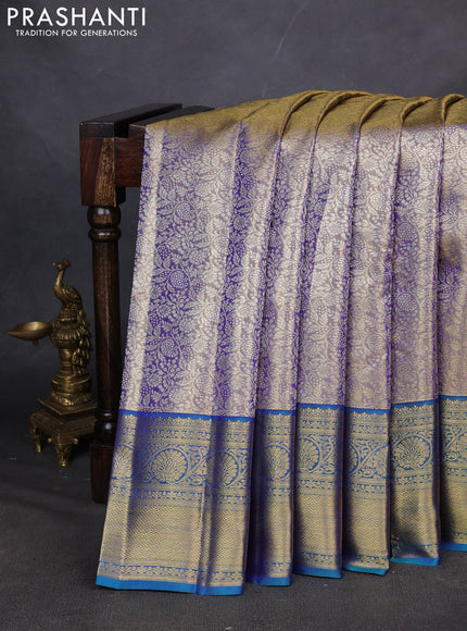 Pure kanchipuram silk saree blue shade and peacock blue with allover zari woven brocade weaves and zari woven border