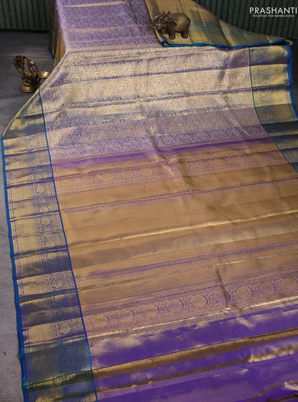 Pure kanchipuram silk saree blue shade and peacock blue with allover zari woven brocade weaves and zari woven border