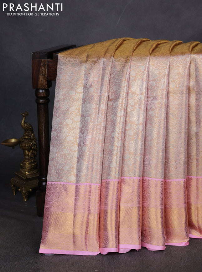 Pure kanchipuram silk saree gold and light pink with allover zari woven brocade weaves and zari woven border