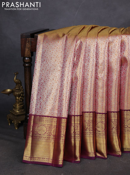 Pure kanchipuram silk saree dual shade of gold and purple with allover zari woven brocade weaves and zari woven border