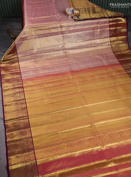 Pure kanchipuram silk saree dual shade of gold and purple with allover zari woven brocade weaves and zari woven border