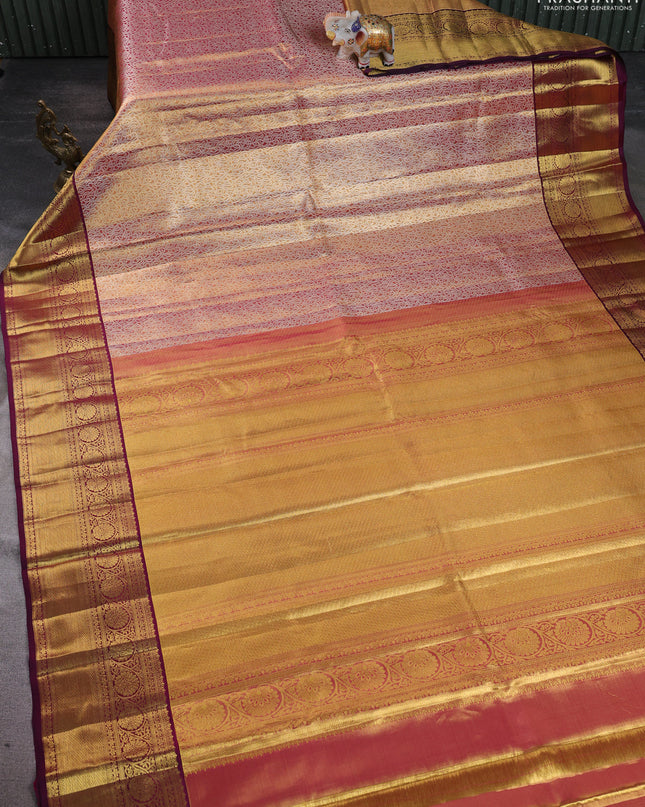 Pure kanchipuram silk saree dual shade of gold and purple with allover zari woven brocade weaves and zari woven border