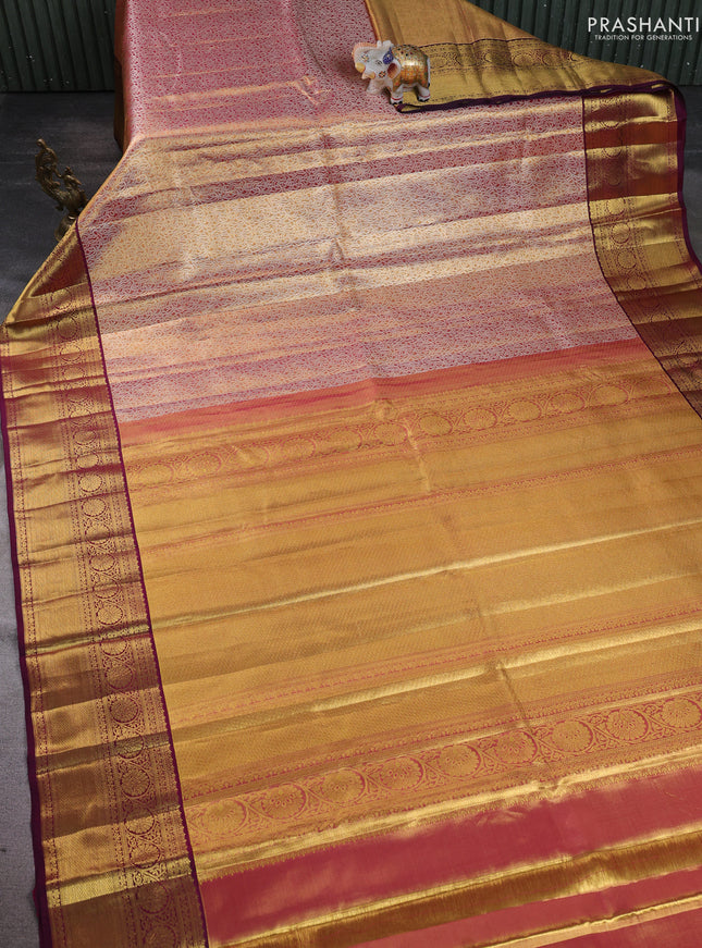 Pure kanchipuram silk saree dual shade of gold and purple with allover zari woven brocade weaves and zari woven border
