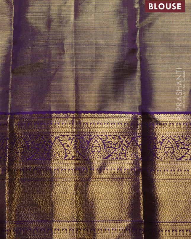 Pure kanchipuram silk saree dual shade of violet with allover zari woven brocade weaves and zari woven border