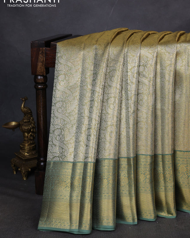 Pure kanchipuram silk saree green shade with allover zari woven brocade weaves and zari woven border