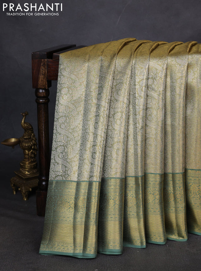 Pure kanchipuram silk saree green shade with allover zari woven brocade weaves and zari woven border