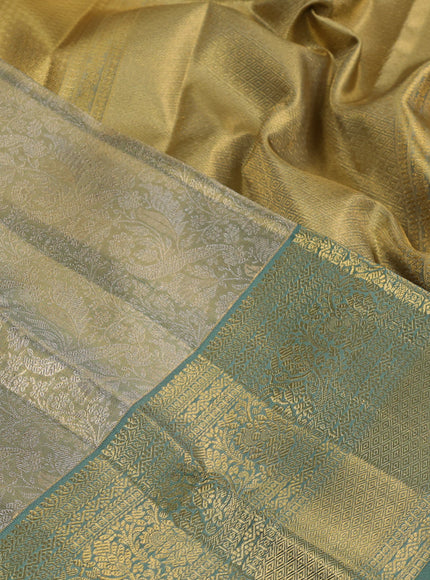 Pure kanchipuram silk saree green shade with allover zari woven brocade weaves and zari woven border