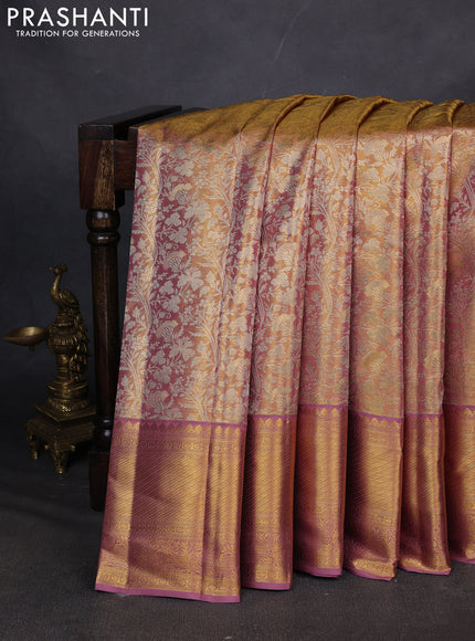 Pure kanchipuram silk saree gold and lavender with allover zari woven brocade weaves and zari woven border