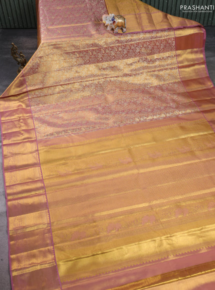 Pure kanchipuram silk saree gold and lavender with allover zari woven brocade weaves and zari woven border