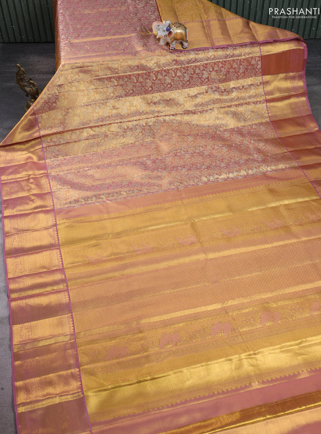 Pure kanchipuram silk saree gold and lavender with allover zari woven brocade weaves and zari woven border