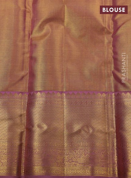 Pure kanchipuram silk saree gold and lavender with allover zari woven brocade weaves and zari woven border