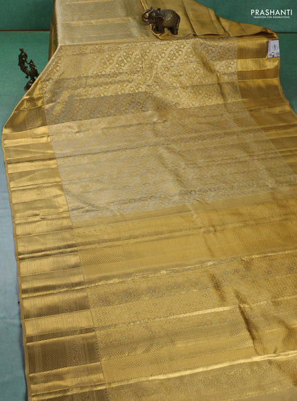 Pure kanchipuram silk saree sandal with allover zari woven brocade weaves and zari woven border