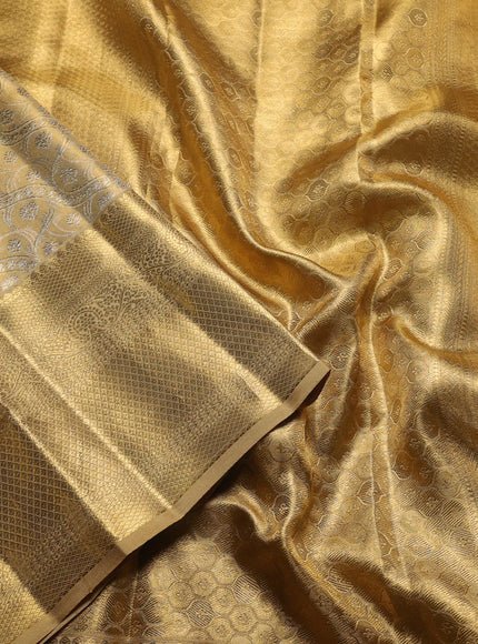 Pure kanchipuram silk saree sandal with allover zari woven brocade weaves and zari woven border