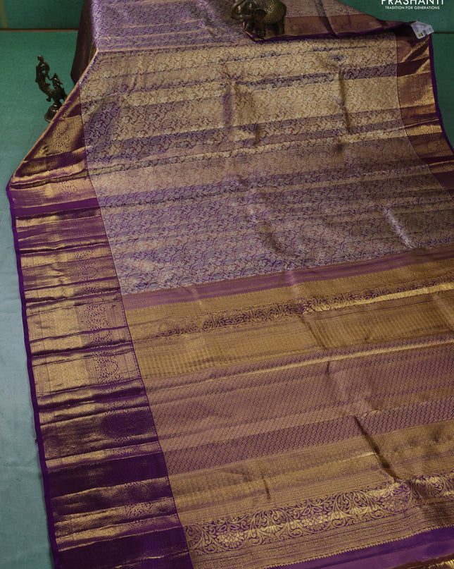 Pure kanchipuram silk saree dual shade of violet with allover zari woven brocade weaves and zari woven border