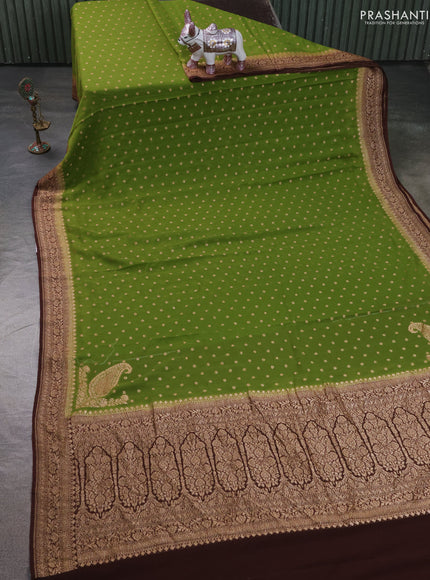 Pure Banarasi georgette saree light green and coffee brown with allover woven buttas and woven border