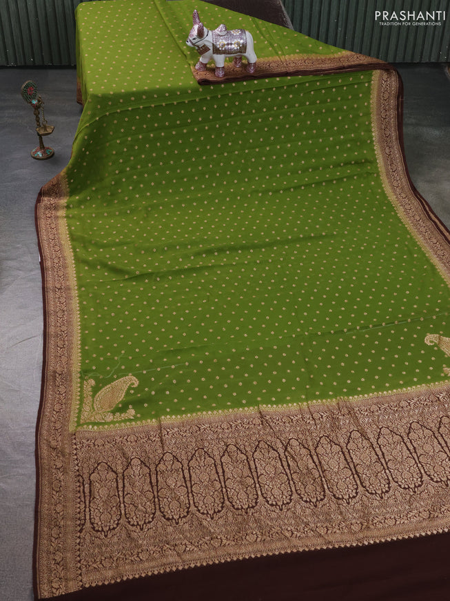 Pure Banarasi georgette saree light green and coffee brown with allover woven buttas and woven border