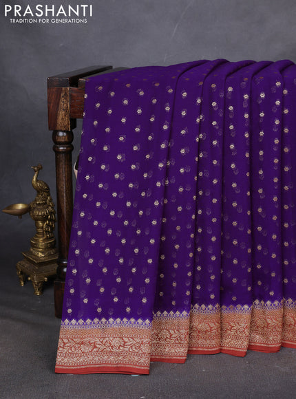 Pure Banarasi georgette saree violet and rust with allover woven buttas and woven border