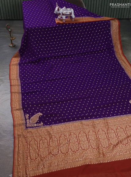 Pure Banarasi georgette saree violet and rust with allover woven buttas and woven border