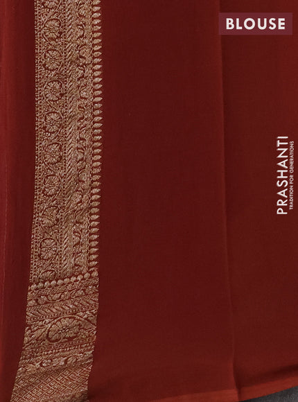 Pure Banarasi georgette saree violet and rust with allover woven buttas and woven border