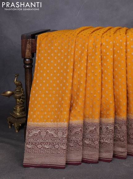 Pure Banarasi georgette saree mustard yellow and wine shade with allover woven buttas and woven border